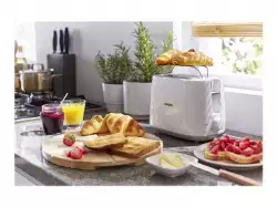 PHILIPS Daily Collection Toaster 8 settings Integrated bun warming rack Compact design